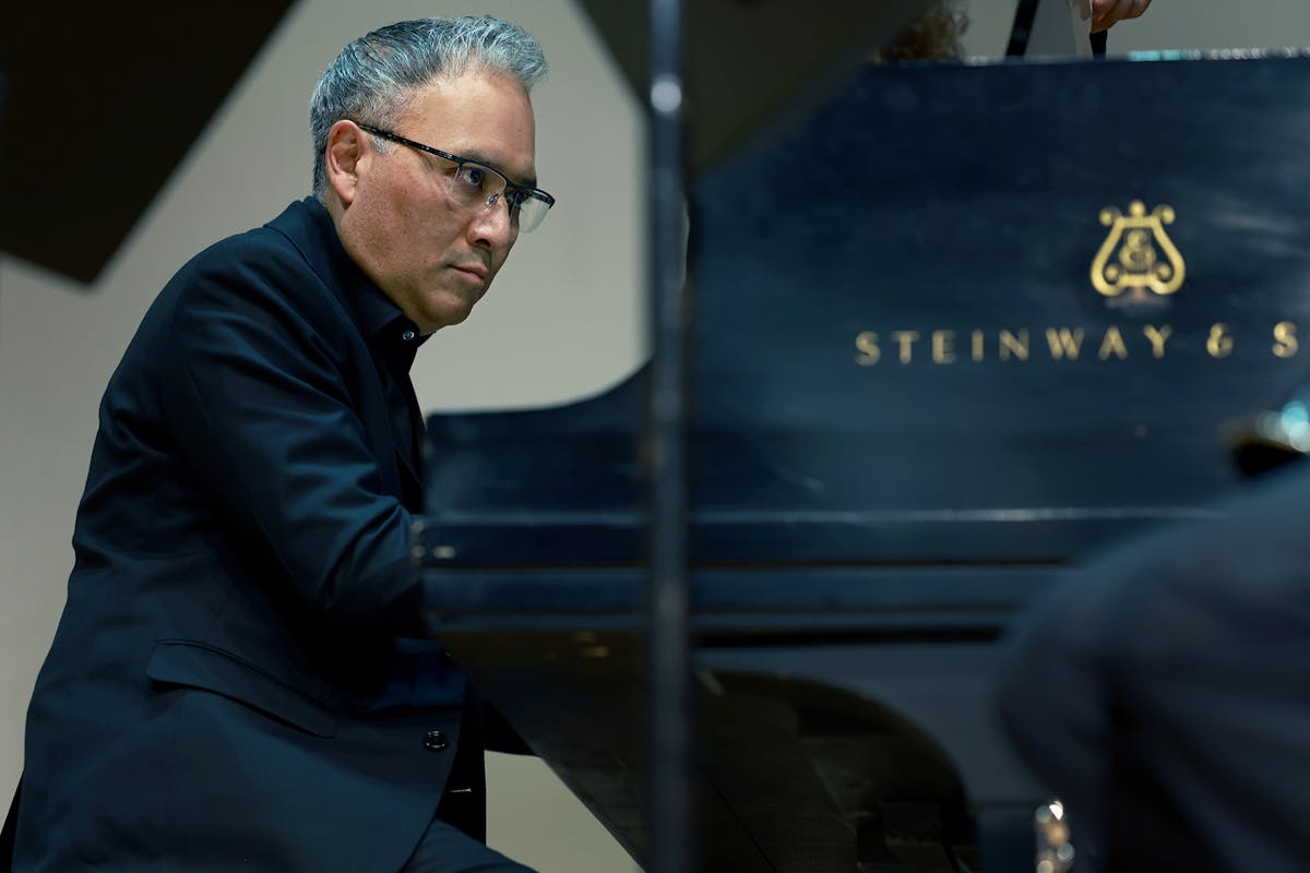 Jon Nakamatsu, concert pianist, performs a solo classical piece during an evening of the Summer Music Festival at Packard Hall which was a full house. Photo by Jamie Cotten / Colorado College